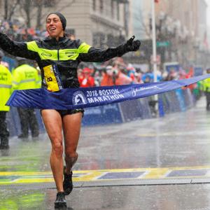 PIX: Kawauchi, Linden record shock wins in rain-soaked Boston Marathon