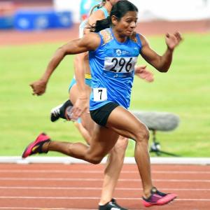Sprint sensation Dutee clinches silver in 100m at Asian Games