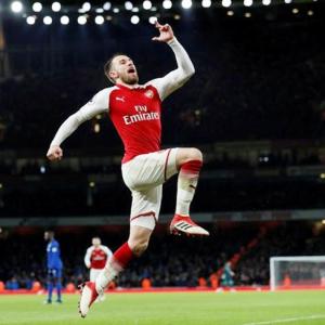 EPL PICS: Ramsey 'tricks' as Arsenal thrash Everton
