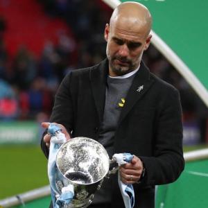 Guardiola vows to carry on wearing yellow ribbon