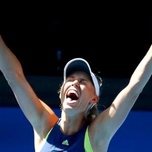 PHOTOS: Wozniacki survives Mertens scare to reach maiden Aus Open final