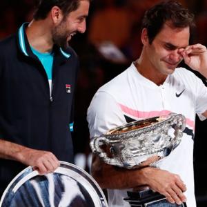 Weeping Federer hails 20th Grand Slam title
