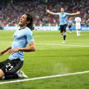 World Cup PIX: Brilliant Cavani brace earns Uruguay win over Portugal