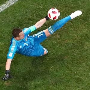 Russian keeper thanks God for luck against Spain