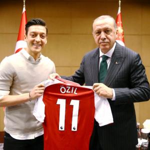 German soccer star Ozil defends photo with Erdogan