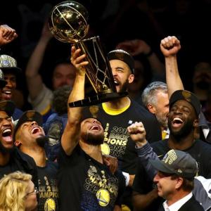 PHOTOS: Warriors rout Cavaliers to win second straight NBA title