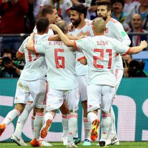 PHOTOS: Spain squeeze past dogged Iran to stay alive