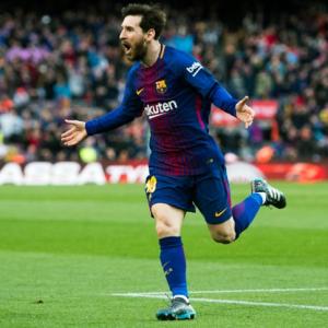 Messi gem lifts Barcelona eight points clear of Atletico