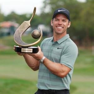 Sports Shorts: Casey wins Valspar as Woods finishes one stroke behind