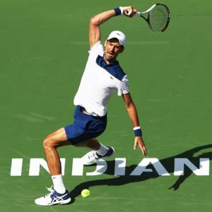 PHOTOS: Djokovic out; Yuki stuns Pouille as Federer, Halep advance
