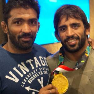 He quit wrestling to give India Olympic champion...