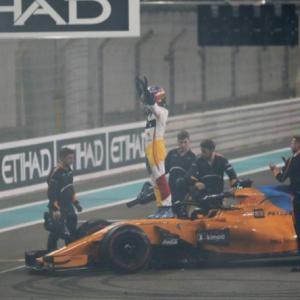 F1: 'Fighter' Alonso bows out with a champion's send-off