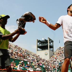 Respect ball kids, Federer tells fellow pros