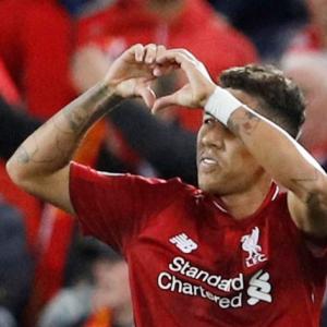 Champions League PIX: Firmino strike gives Liverpool win over PSG