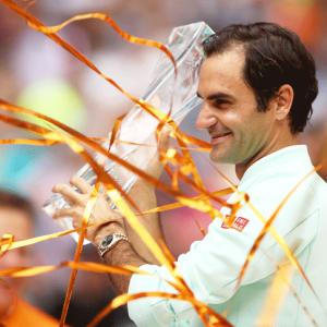 Federer ticks on with Swiss precision for 101st title