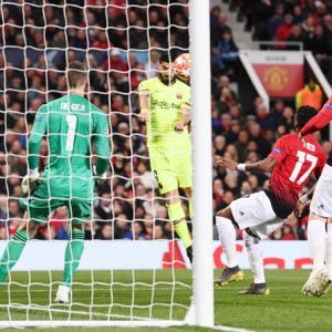 Champions League: Barca down United; Ajax hold Juve