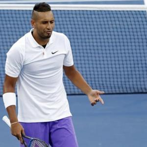 Kyrgios mostly keeps his cool to see off Hoang