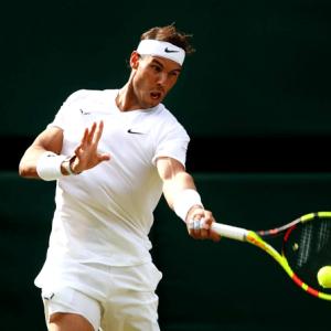 Wimbledon PIX: Federer, Rafa advance; Kerber out