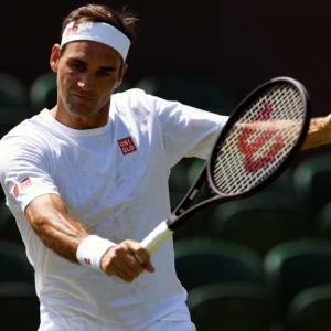 Federer opposes on-court coaching