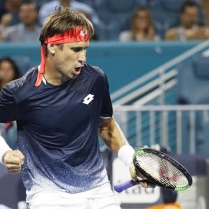 Ferrer stuns Zverev, Federer fights back; Osaka out