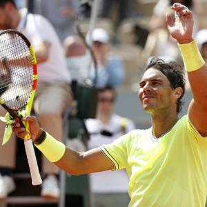 French Open PIX: Nadal, Djokovic advance; Wozniacki out