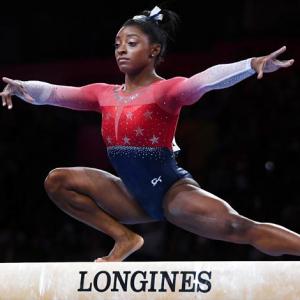 Biles rewrites history as US romp to fifth World title