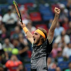 Djokovic, Federer bow out as 'Next Gen' stars roar