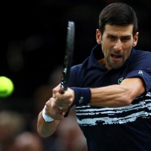 Djokovic sees off Edmund; Barty in WTA Finals semis