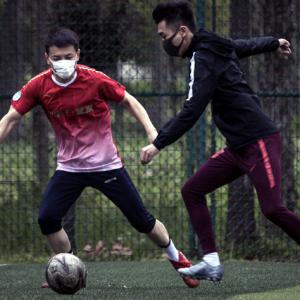 China's footballers join clubs after 14-day quarantine