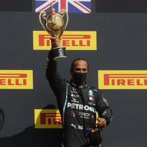 F1 PIX: Hamilton wins British GP with punctured tyre