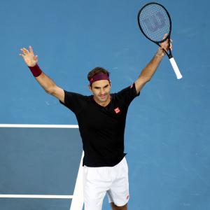 PIX: Federer survives huge scare; Djokovic cruises