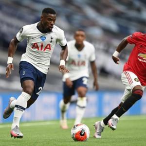 PIX: United clinches draw at Tottenham on EPL return