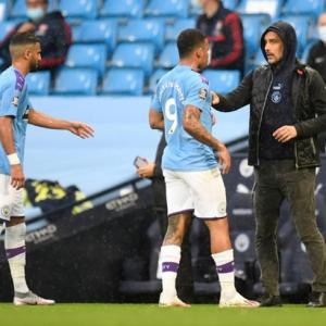 Man City: Guardiola concedes defeat in title race