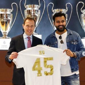 Real Madrid present Rohit with customised jersey