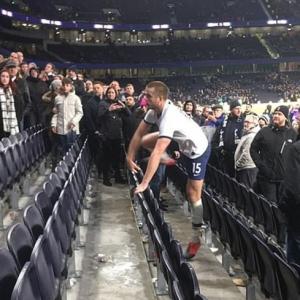 Tottenham's Dier jumps into stands to fight a fan
