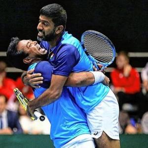 Paes-Rohan keep India alive; Fed Cup creates history