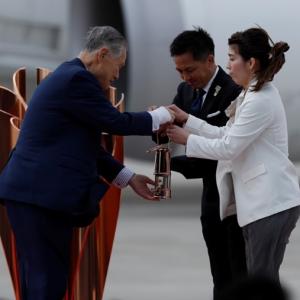 Olympic flame arrives in Japan amid worries over virus