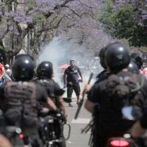 PHOTOS: Riot breaks out at Maradona's funeral