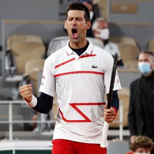 PIX: Djokovic survives scare to set up Tsitsipas semis