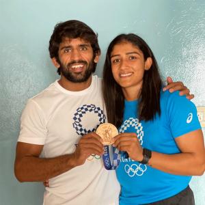 Bajrang, Sangeeta and their Bronze medal