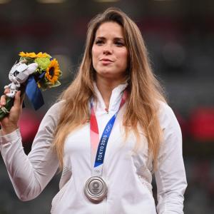 Athlete auctions Olympic medal for infant's surgery