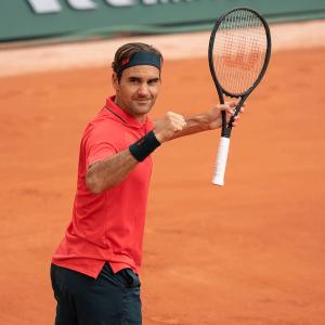 Federer happy to find higher gear against Cilic