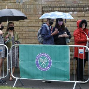 Just like old times as rain delays start of Wimbledon