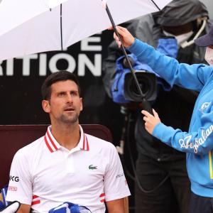 Djokovic fumes at umpire in rain-affected Rome opener