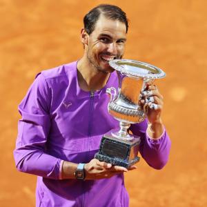 Nadal overcomes blip to down Djokovic in final