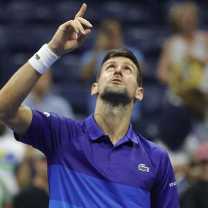 PIX: Djokovic fights back to beat Berrettini
