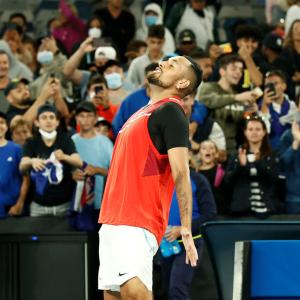 Showman Kyrgios goes from sick-bed to second round