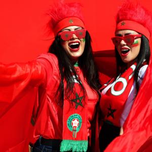 PIX: Morocco, Croatia fans paint the stadium RED