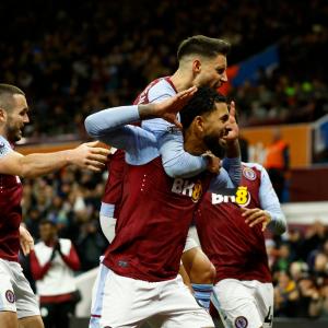 EPL PIX: Villa up to second; United lose