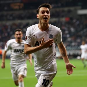 Mesut Ozil hangs up his boots
